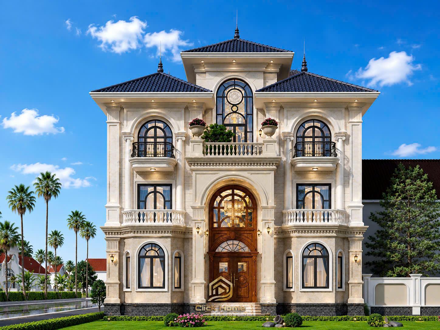 Thiết kế mặt tiền biệt thự kiểu Pháp sang trọng trong nắng sớm. Hình ảnh trực diện làm nổi bật hệ cột trụ vững chãi, vòm cửa cao ráo và các chi tiết phào chỉ đối xứng tinh xảo của ngôi nhà.